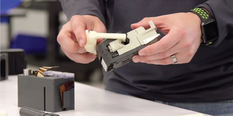 Several of CSI’s 3D printed manufacturing aids.